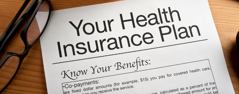 paperwork that reads your health insurance plan