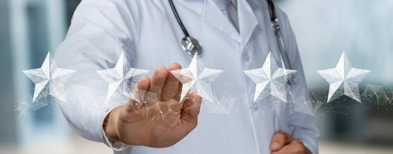 doctor touching an image of five stars in front of him