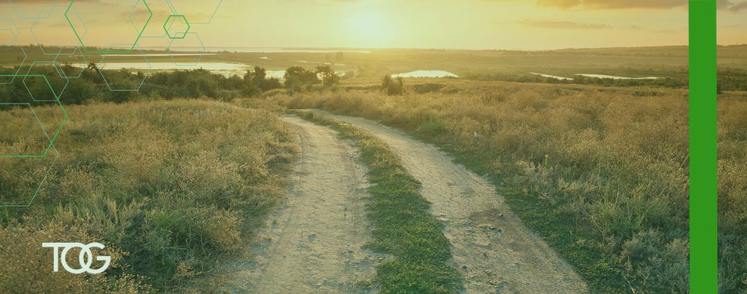 Sunset featuring a rural gravel road somewhere in the Midwest.